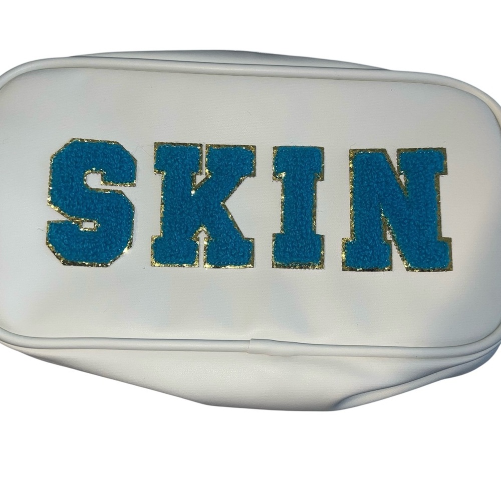 Neutrogena White Skin Travel Pouch with Blue Lettering NWT